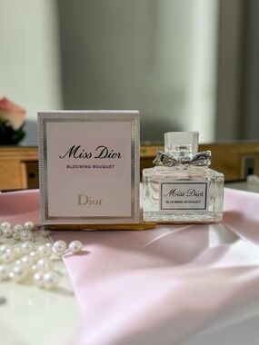 Christian Dior, Miss Dior
Blooming Bouquet EDT. NIB, 5 mL/0.17 oz.